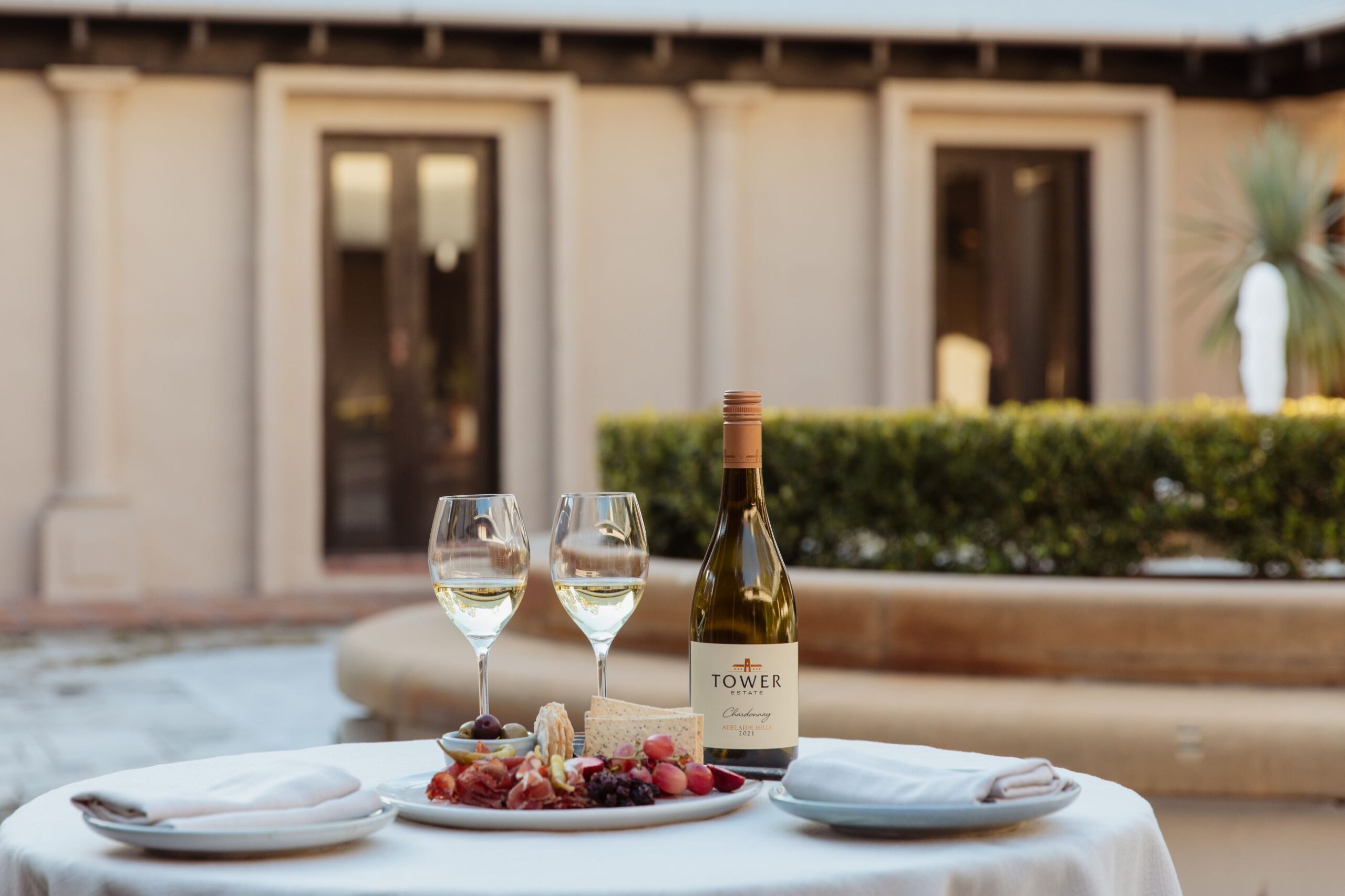 Tower-Lodge-Courtyard-with-wine-and-cheese-4-11-scaled.jpg